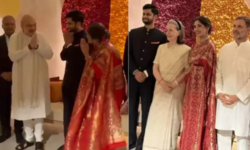 പ്രതിപക്ഷ പ്രതിഷേധത്തിനിടെ അമിത് ഷായും രാഹുലും ഒരേ വേദിയിൽ; അപൂർവ രാഷ്ട്രീയ കൂടിക്കാഴ്ച വിവാഹ സൽക്കാരത്തിൽ