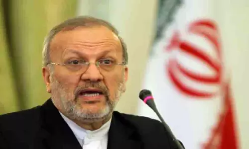 Former Iranian Foreign Minister Manouchehr Mottaki speaking at an event regarding US military bases in the Middle East