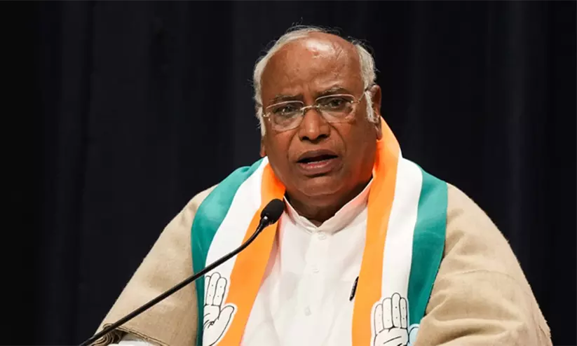 AICC President Mallikarjun Kharge addressing the gathering and criticizing the education department over RSS influence AICC President Mallikarjun Kharge addressing the gathering and criticizing the education department over RSS influence