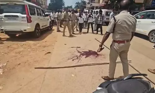 Police tape at the crime scene in Hubballi, Karnataka following broad daylight murder. Police tape at the crime scene in Hubballi, Karnataka following broad daylight murder.