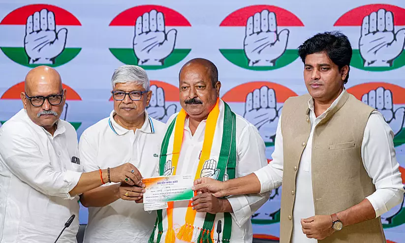 Former AIMIM national spokesperson Asim Waqar joining Congress at AICC headquarters in New Delhi. Former AIMIM national spokesperson Asim Waqar joining Congress at AICC headquarters in New Delhi.