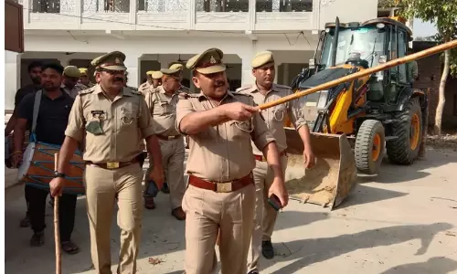 Heavy police deployment and security forces stationed outside the Saharanpur Collectorate complex during the demolition drive.