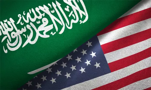flags representing the US-Saudi Arabia arms defense deal.