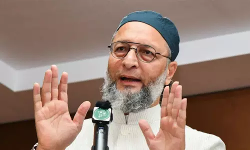 AIMIM chief Asaduddin Owaisi addressing a press conference alongside a split visual of security deployment outside the Saharanpur Collectorate. AIMIM chief Asaduddin Owaisi addressing a press conference alongside a split visual of security deployment outside the Saharanpur Collectorate.