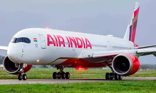 Air India Express aircraft parked at Cochin International Airport following an emergency landing due to technical glitch