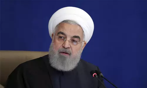 File photo of former Iranian President Hassan Rouhani speaking at a political summit. File photo of former Iranian President Hassan Rouhani speaking at a political summit.