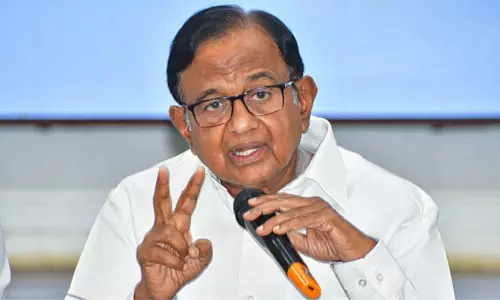 Senior Congress leader P Chidambaram addressing a political press conference on international relations.