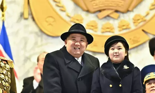 North Korean leader Kim Jong Un attending an official military inspection alongside his daughter Kim Ju Ae. North Korean leader Kim Jong Un attending an official military inspection alongside his daughter Kim Ju Ae.