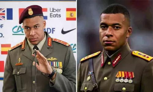 Kylian Mbappé reacting to the viral dictator meme graphic.