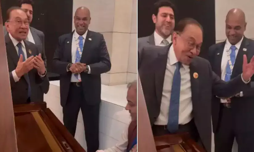 Malaysian Prime Minister Anwar Ibrahim singing a classic Hindi song with a musical troupe in New Delhi. Malaysian Prime Minister Anwar Ibrahim singing a classic Hindi song with a musical troupe in New Delhi.