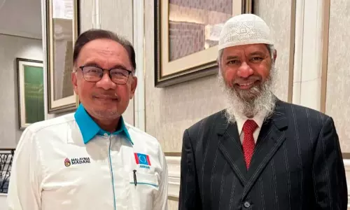Malaysian Prime Minister Anwar Ibrahim with Zakir Naik