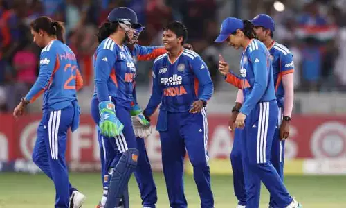 Indian womens cricket team celebrating their victory with the Asia Cup trophy in Dubai