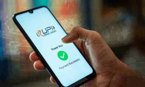 A smartphone displaying UPI payment options, illustrating the new financial regulations on transactions above Rs 2,000. A smartphone displaying UPI payment options, illustrating the new financial regulations on transactions above Rs 2,000.