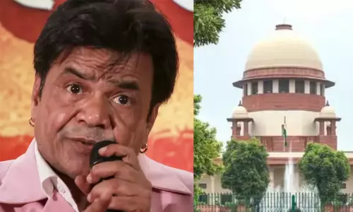 Bollywood actor Rajpal Yadav arriving at court proceedings in connection with the cheque bounce case.