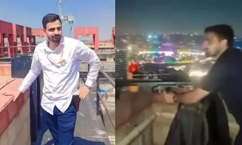 Delhi Cop Films Reels With Gun