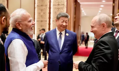 PM Narendra Modi and Chinese President Xi Jinping during the BRICS summit opening session at Bharat Mandapam in New Delhi.