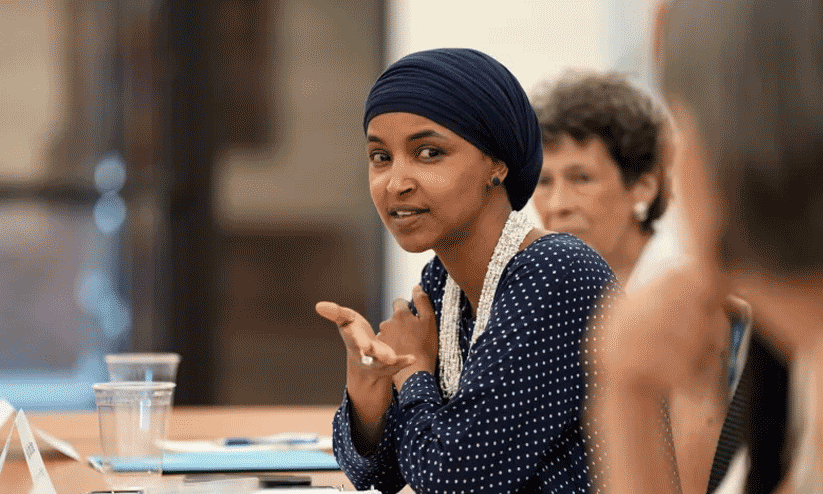 U.S. Representative Ilhan Omar addressing an official congressional gathering. U.S. Representative Ilhan Omar addressing an official congressional gathering.