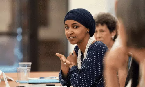 U.S. Representative Ilhan Omar addressing an official congressional gathering.