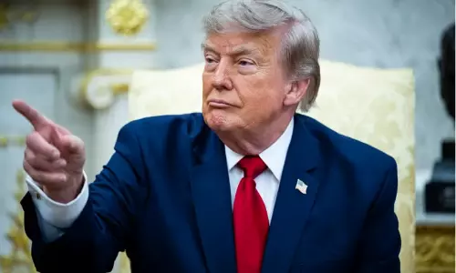 US President Donald Trump addressing the media on international security policies.
