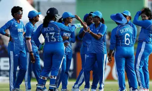 Indian womens cricket team celebrating their gold medal victory against Sri Lanka in the Asian Games final.