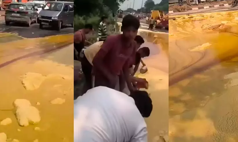 ടാങ്കർ ലോറി മറിഞ്ഞ് നെയ്യ് റോഡിൽ പരന്നൊഴുകി; പാത്രങ്ങളും ബക്കറ്റുകളുമായി തടിച്ചുകൂടി ജനം ടാങ്കർ ലോറി മറിഞ്ഞ് നെയ്യ് റോഡിൽ പരന്നൊഴുകി; പാത്രങ്ങളും ബക്കറ്റുകളുമായി തടിച്ചുകൂടി ജനം