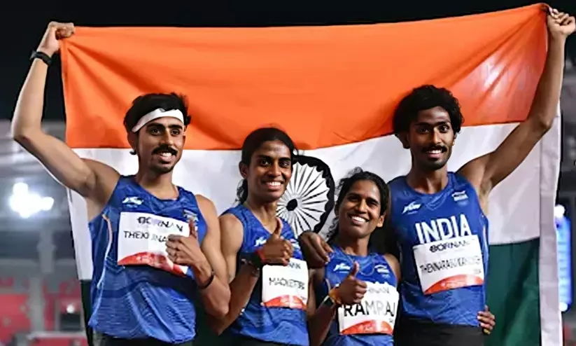 ഏഷ്യൻ ഗെയിംസ്: റിലേയിൽ മലയാളിതാരം ടി.എസ് മനു ഉൾപ്പെട്ട ടീമിന് വെള്ളി; 10000 മീറ്ററിൽ ചരിത്ര മെഡലുമായി സീമാകുമാരി ഏഷ്യൻ ഗെയിംസ്: റിലേയിൽ മലയാളിതാരം ടി.എസ് മനു ഉൾപ്പെട്ട ടീമിന് വെള്ളി; 10000 മീറ്ററിൽ ചരിത്ര മെഡലുമായി സീമാകുമാരി