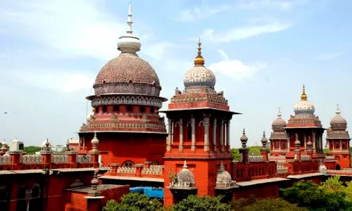 Madras High Court building emblem representing justice and judicial remedies. Madras High Court building emblem representing justice and judicial remedies.