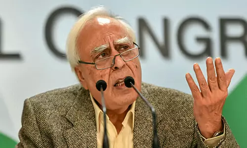 Senior Advocate and Rajya Sabha MP Kapil Sibal addressing a press conference in New Delhi.