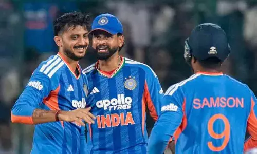 Indian cricket team celebrating a victory on the field during the Asian Games