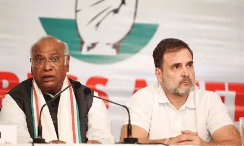 Congress President Mallikarjun Kharge chairing the Congress Working Committee (CWC) meeting in New Delhi with Rahul Gandhi. Congress President Mallikarjun Kharge chairing the Congress Working Committee (CWC) meeting in New Delhi with Rahul Gandhi.