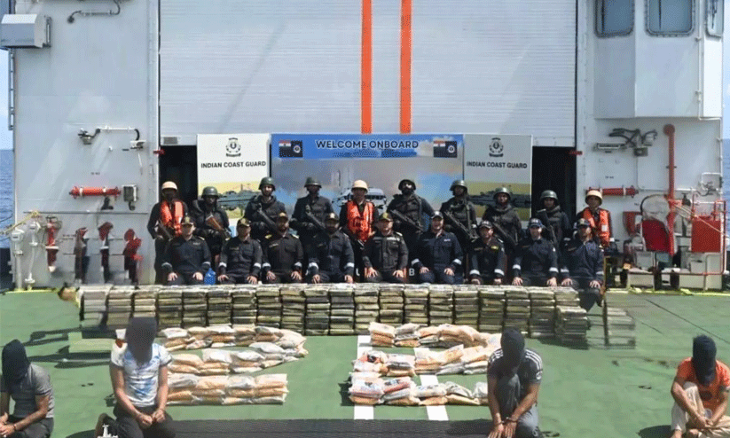 Indian Coast Guard ship and seized boat carrying illegal narcotics in the Arabian Sea Indian Coast Guard ship and seized boat carrying illegal narcotics in the Arabian Sea