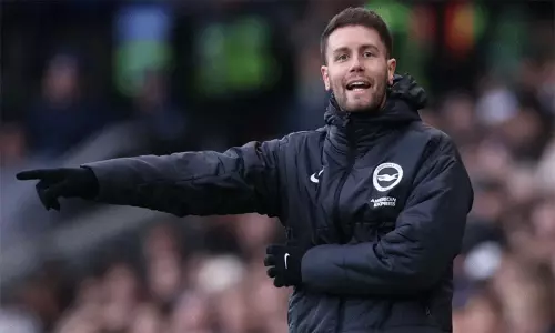 Brighton manager Fabian Hürzeler giving tactical instructions from the touchline during a Premier League game.