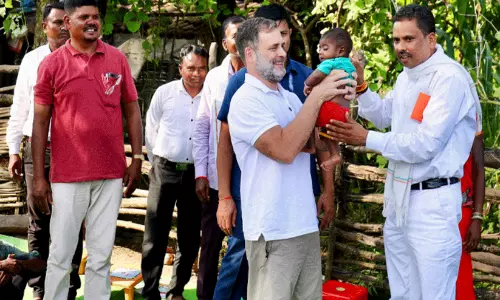 Leader of Opposition Rahul Gandhi interacting with tribal families in Jagla village, Balaghat district.