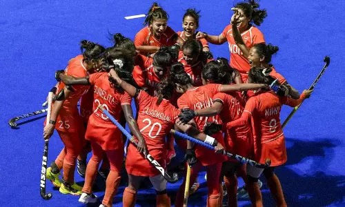 Indian womens hockey team celebrating Asian Games gold medal victory against China in Nagoya