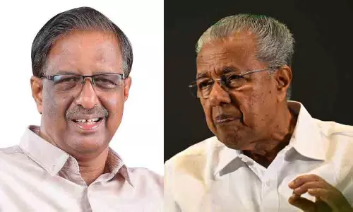 Opposition Leader Pinarayi Vijayan addressing the public meeting and defending P Nandakumar Opposition Leader Pinarayi Vijayan addressing the public meeting and defending P Nandakumar
