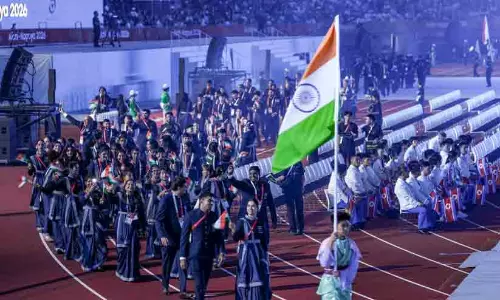 Indian athletes competing and celebrating success at the Asian Games in Nagoya Indian athletes competing and celebrating success at the Asian Games in Nagoya