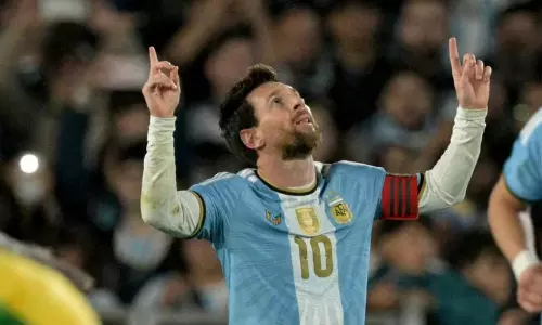 Lionel Messi celebrating with teammates during his emotional farewell match for Argentina against Benin in Buenos Aires