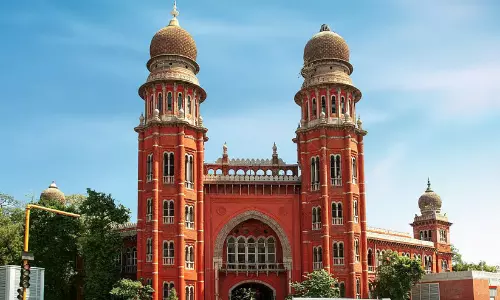 The Madras High Court building representing the division bench ruling on FCRA registration and religious conversion.