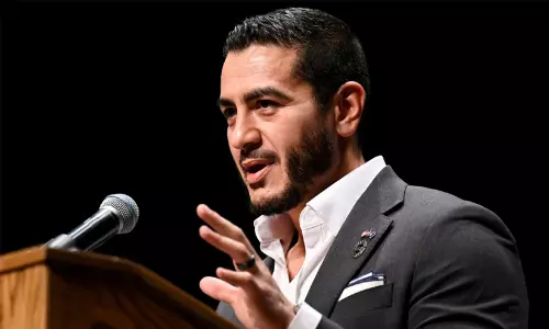 Democratic US Senate candidate Abdul El-Sayed addressing supporters during a campaign event in Michigan alongside Governor Gretchen Whitmer.