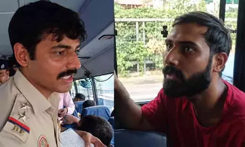 Protesters reacting inside a Delhi Police bus during a demonstration at Jantar Mantar demanding the CECs resignation
