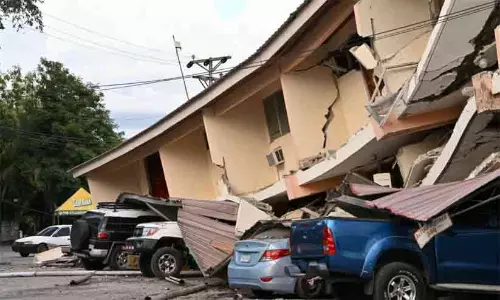 Cracked roads and partially collapsed structures in Panama following powerful 7.7 magnitude earthquake and aftershocks.