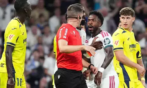 Vinicius Junior reacting after receiving a red card from the referee during Real Madrids match against Villarreal