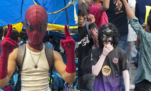 Young protesters in New Delhi using masks and creative methods to dodge facial recognition surveillance during demonstrations.