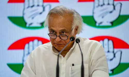 Congress General Secretary Jairam Ramesh addressing media on rising retail inflation and food price surge.
