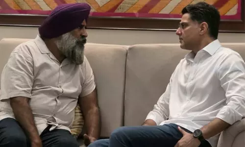 New Punjab Congress President Pargat Singh alongside Sachin Pilot discussing strategy for upcoming assembly elections.