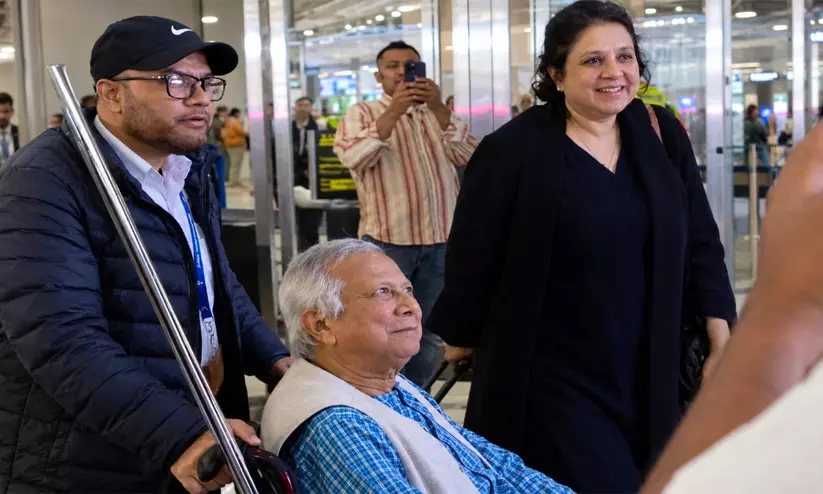 Former Bangladesh interim chief adviser Muhammad Yunus being escorted through New York JFK airport amid protests. Former Bangladesh interim chief adviser Muhammad Yunus being escorted through New York JFK airport amid protests.