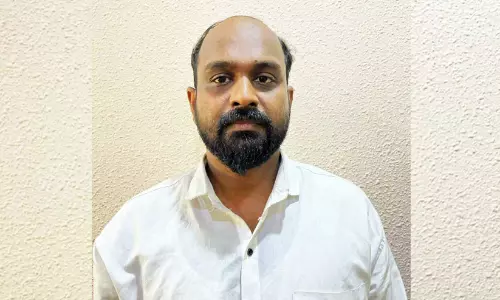 ഒപ്പം താമസിച്ച യുവതിയുടെ നഗ്ന ഫോട്ടോയും ഫോൺ നമ്പറും പ്രചരിപ്പിച്ച യുവാവ് പിടിയിൽ