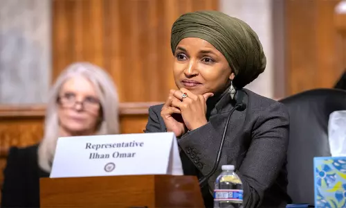 Democratic Congresswoman Ilhan Omar addressing reporters outside Capitol Hill in Washington DC.