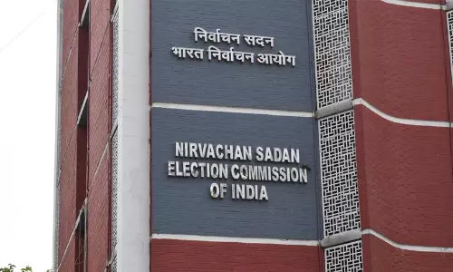 Election Commission of India Nirvachan Sadan headquarters in New Delhi with electoral roll documents in the background. Election Commission of India Nirvachan Sadan headquarters in New Delhi with electoral roll documents in the background.