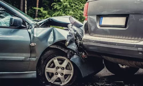 Karnataka High Court gavel placed over car steering wheel graphic representing legal liability of parents for minor driving accidents. Karnataka High Court gavel placed over car steering wheel graphic representing legal liability of parents for minor driving accidents.